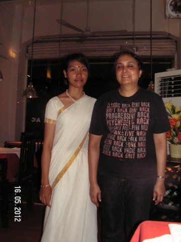 A Cambodian waitress and me at 'The Indian' restaurant in Siem Reap