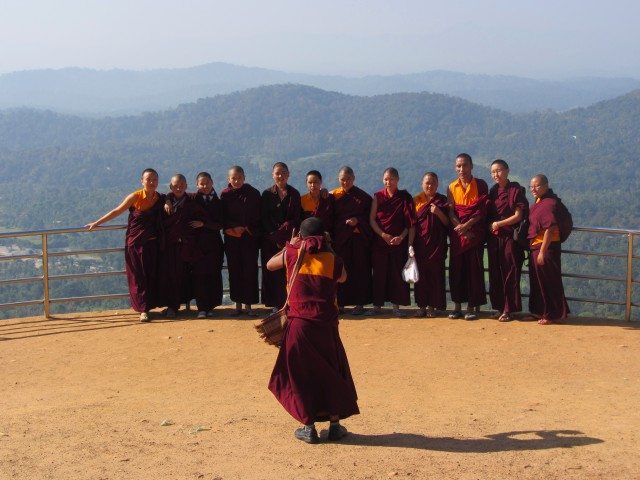 The person taking the photo is the leader of the group