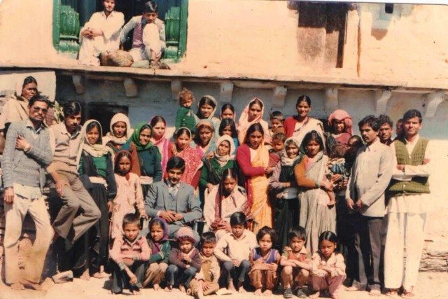 At my village (me on the last row in green with my mother)