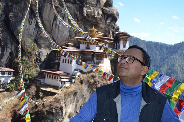 My friend KKD praying, “God give me strength to keep going”]