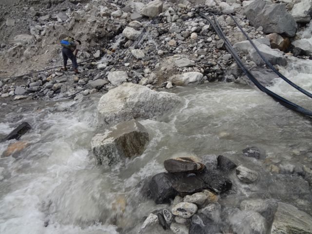 Broken stretch of road after Nako village