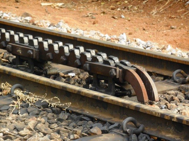 Rack rail in the middle of tracks