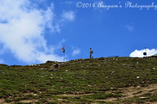 A Jawan marching towards Tricolour Flag