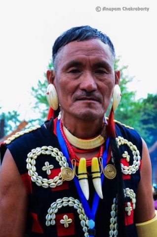 A Naga man in traditional attire