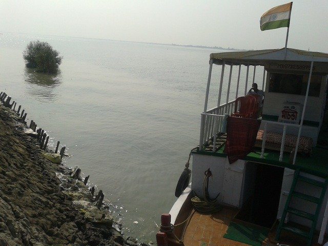 Halt at a Riverside Village