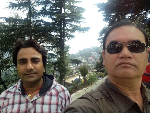 Deepak, our guide cum chauffeur with me at Dalhousie