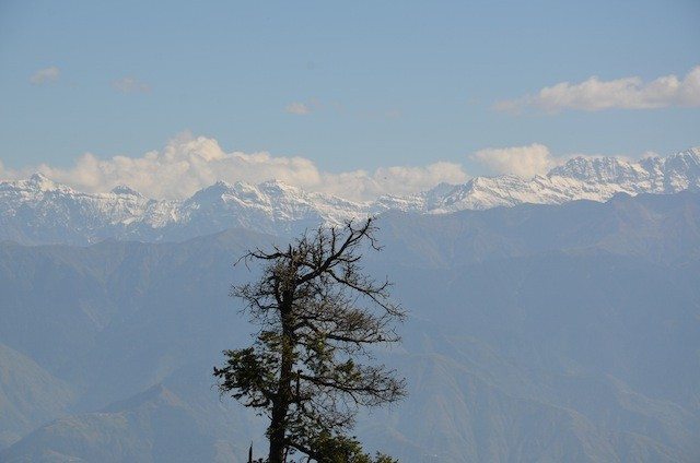 Snow-capped series of Himalayan peaks, view from Dyan Kund