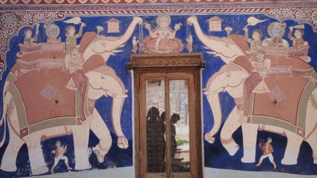 Elephants showering milk on Goddess Lakshmi