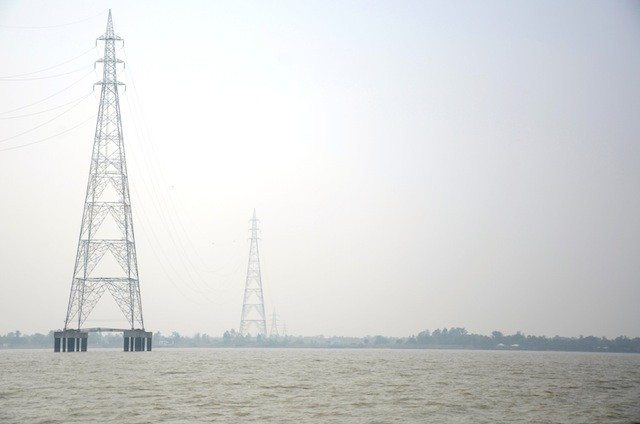 Transmission towers erected in the very deep Muriganga river. Power is transmitted to Sagar island from main land with the help of these towers