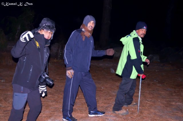On the night trail to Dong. From the right my friend Prakash, Chandra and myself